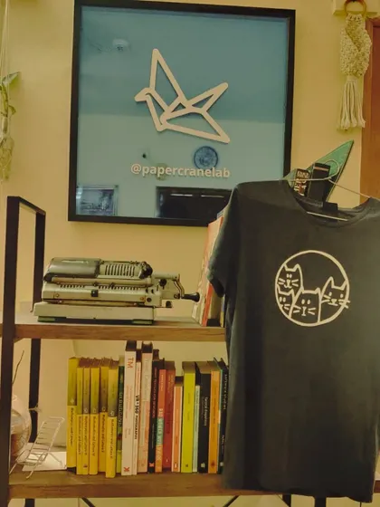 This t-shirt, featuring a design of our favorite cats, was made right here in our lab using our vinyl cutter. It's a great example of the high-quality, personalized apparel your team can create in our workshops.