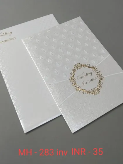 A very simple and affordable white invitation with a textured background and a classic gold wreath emblem. Perfect for a clean and minimalist announcement.