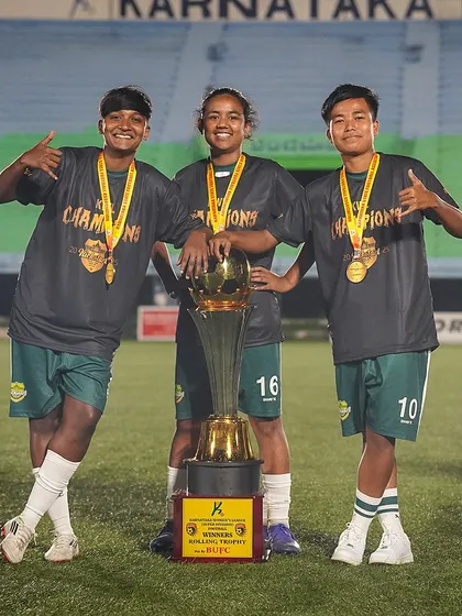 Champions together. Three of our victorious players posing with the Karnataka Women's League rolling trophy and their winners' medals after a successful season.