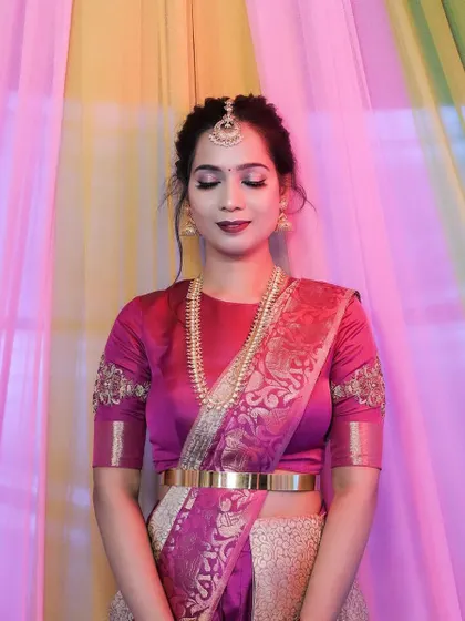 A serene shot with her eyes closed, looking peaceful and beautiful.
