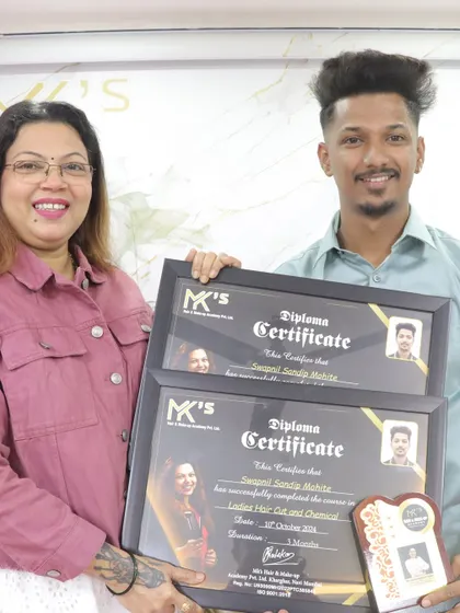 A proud graduate receiving his Diploma Certificates for Ladies Hair Cut and Chemical work. He is now a certified professional, ready for the industry.