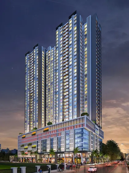 The Voraskyline Icon residential project at night. The lighting design highlights the building's facade details and its multi-level podium, which integrates retail and residential amenities.