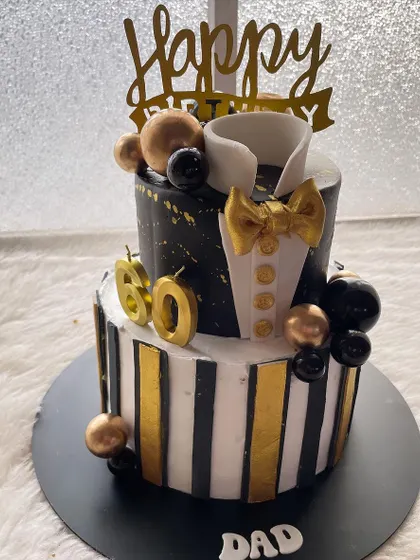 Another view of the sophisticated two-tier tuxedo cake. It's the perfect way to celebrate a milestone birthday for a distinguished gentleman.
