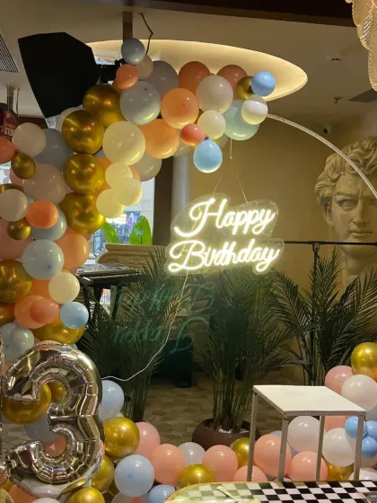 Another view of the 13th birthday party decor, showing how it transforms a corner of a restaurant into a dedicated celebration zone.