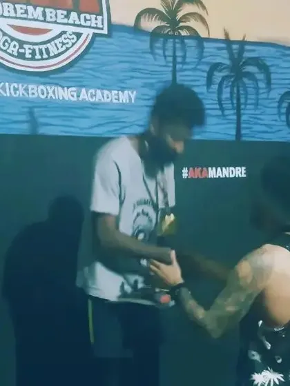 Shaking hands after the grappling match. We compete hard, but always with sportsmanship.