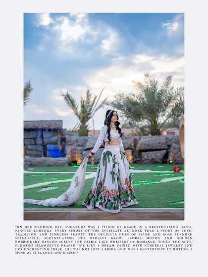 A full-length portrait of a bride in a unique, hand-painted lehenga. This artistic shot, styled like a magazine page, highlights the beauty and grace of her attire.