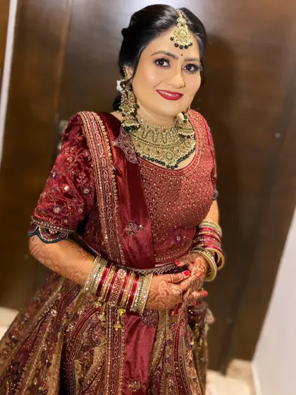 My pretty bride Pallavi, looking gorgeous in a deep red lehenga. We went for a classic bridal look with a bold lip and soft, shimmering eyes.