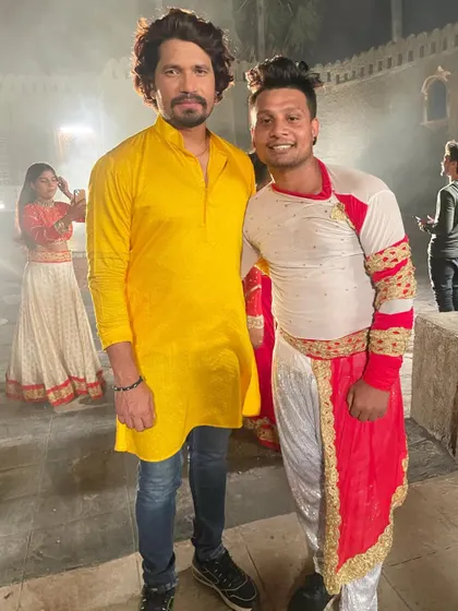 On set with actors Pravesh Lal Yadav and Dinesh Lal Yadav. It's an honor to work with such big names in the Bhojpuri film industry.