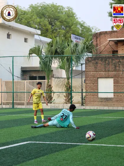 The aftermath of a great save. Our goalkeepers are trained to be agile, brave, and commanding in their area. Every save is a small victory.