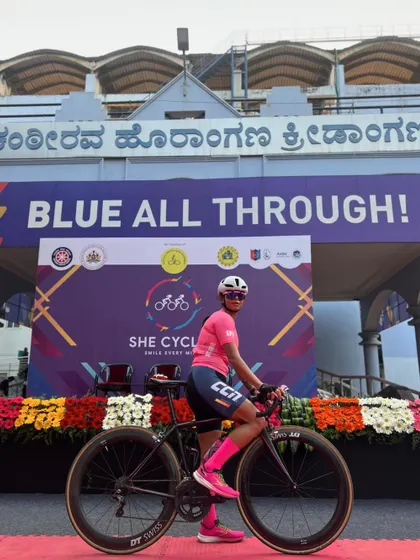 Posing with my bike at the "She Cycles" event. A proud moment to celebrate women in cycling.