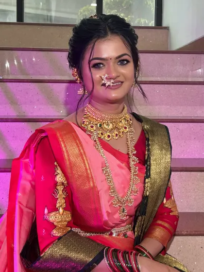 A happy and bright portrait of the bride, her smile lighting up her entire look.