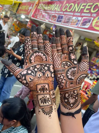 The same design captured in a bustling market setting, showing the artwork in a different light.