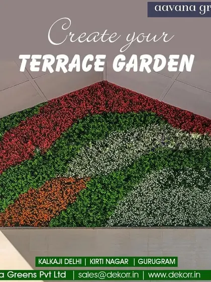 Create your terrace garden with a custom-designed vertical wall. This installation mimics the shape of a house, using different colored foliage to create a playful and artistic green feature.