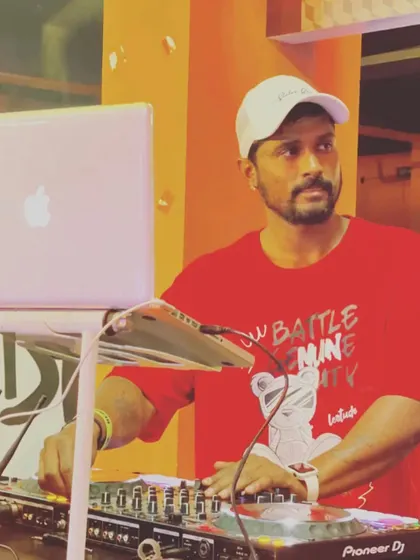A great shot of me mixing at the gym event. The energy was different but just as powerful.