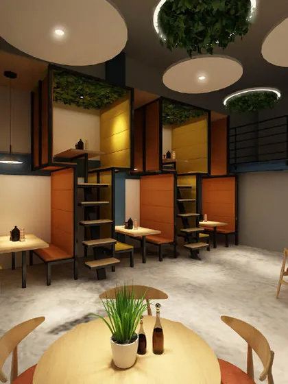Another view of the office recreational area, showing the multi-level seating pods. This innovative design provides semi-private spaces for informal meetings or quiet breaks.
