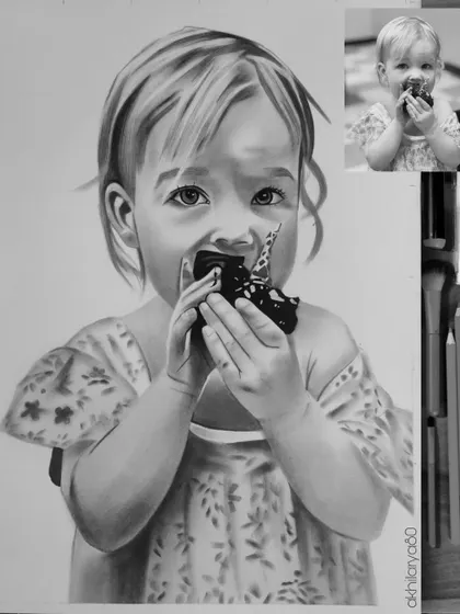 This A4 graphite sketch of a little girl eating a cupcake is a moment of pure, candid joy. Black and white art is great for freezing these fleeting, beautiful memories in time.