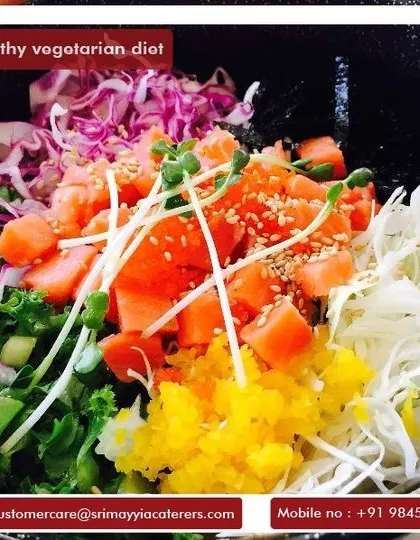 Planning a healthy vegetarian diet? We offer a variety of fresh and vibrant salads, like this colourful bowl of mixed greens, vegetables, and sprouts.