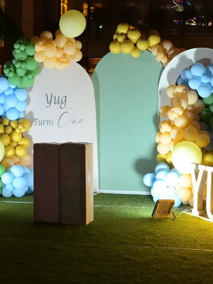 A close-up of the arched backdrops for the baby elephant theme.