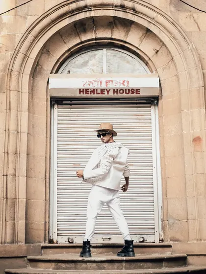 A dynamic pose that captures the energy of the performance-themed shoot.