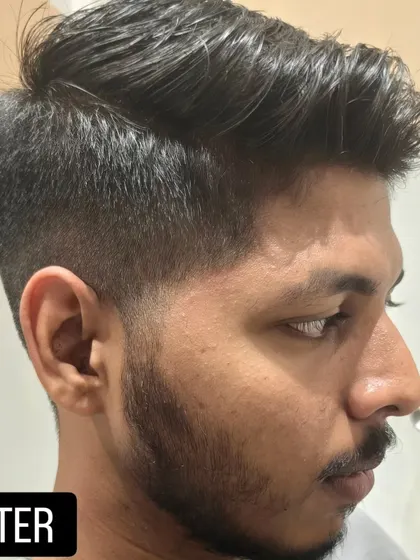 After the transformation. The same client with a fresh haircut and neatly trimmed beard.