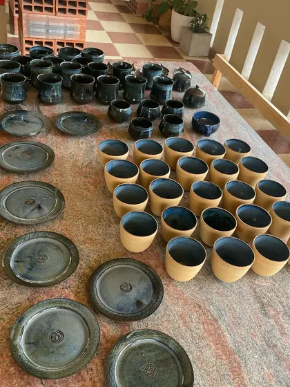 I love the beautiful imperfections that can happen during firing. This batch of stoneware cups and plates came out with a stunning, deep blue glaze that has so much character.