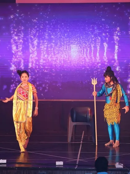 A dramatic scene from our Shiv prayer dance at the 2024 showcase. The costumes and lighting create a powerful theatrical experience.