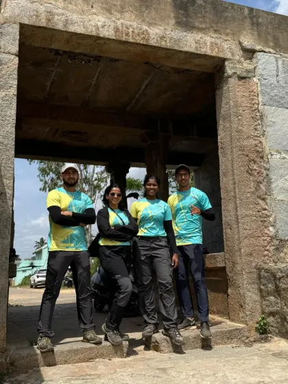 Our certified trek leaders, seen here at an ancient gateway on the Uttari Betta trail, are always with your group. We ensure safety and share interesting facts about the local history and nature.