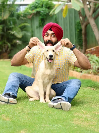 Adding a little goofiness to every shot makes for the best memories. This dog dad and his pup are perfectly matched with their big, happy ears.