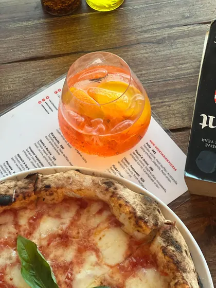 Margherita in one hand, summer in the other. Our Aperol Spritz is the perfect summer sip.