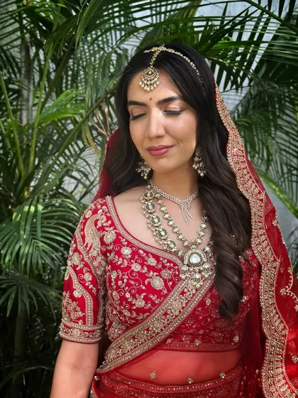 An eyes-closed shot to showcase the soft, blended eyeshadow and perfectly defined brows.