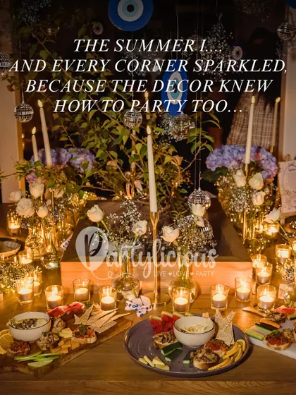 This image captures the mood of a summer party where the decor sparkled just as much as the conversation. The combination of candlelight, fresh appetizers, and subtle themed elements created an unforgettable evening.
