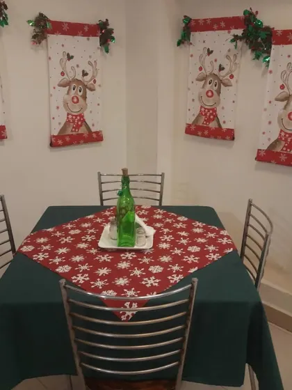 An intimate table for four, perfect for a quiet Christmas meal with loved ones.