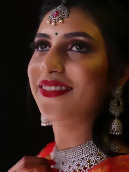 A happy, upward glance from the bride. The makeup is designed to be flawless from every angle.