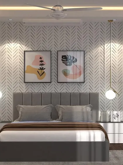 This is a design render for a master bedroom at Piramal Vaikunth, Thane, showcasing a calm and sophisticated retreat. The design features a textured herringbone accent wall, a plush grey upholstered bed, and delicate pendant lights that provide warm, ambient lighting.