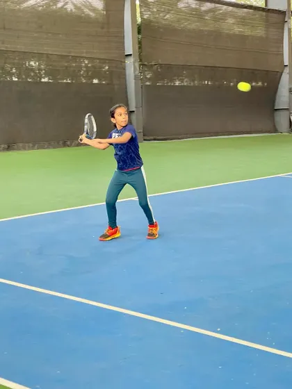 A young athlete executes a forehand with precision during a UTR event at our academy. We train our players to perform under the pressure of a real match.