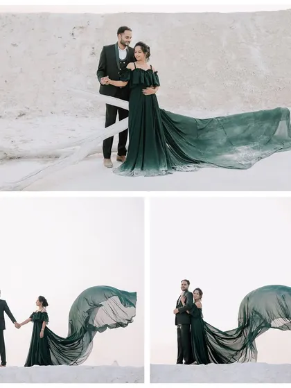 For couples wanting a dramatic and high-fashion feel, I use elements like flowing gowns to create stunning visuals. Here, the contrast between the deep green dress and the stark white landscape of my studio set results in a powerful, cinematic pre-wedding portrait.