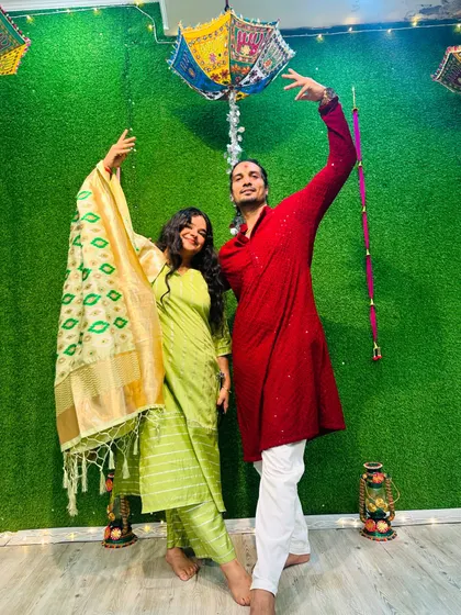 Me and one of our talented instructors striking a pose during our Diwali celebration. The studio was beautifully decorated for the festival of lights.