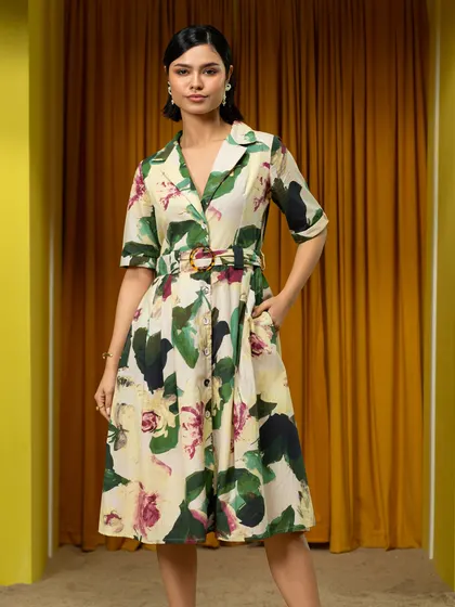 A classic lookbook shot for Boho-Chic, featuring a belted dress against the studio's custom set.