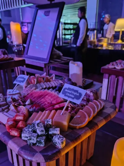 A beautifully arranged cheese and charcuterie board from the Mercedes-EQ launch event. We include a variety of textures and flavours, from smoked English cheddar to fresh fruits and crackers.