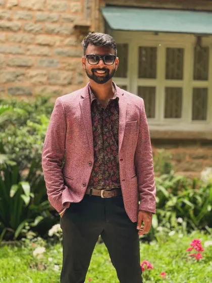 A smiling, confident pose. I bring not just music but also a positive and professional presence to your event.