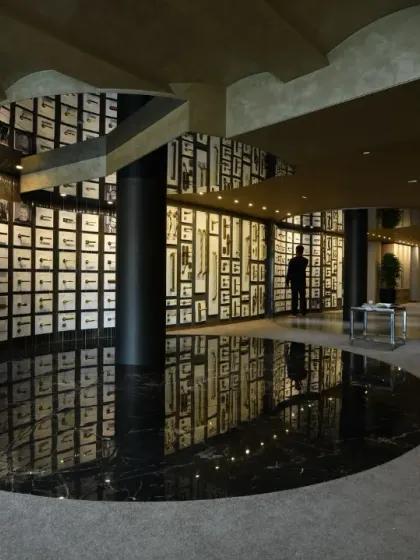 Where craftsmanship meets innovation. The Gala showroom features a dramatic circular display area with a black marble floor, creating an immersive showcase.