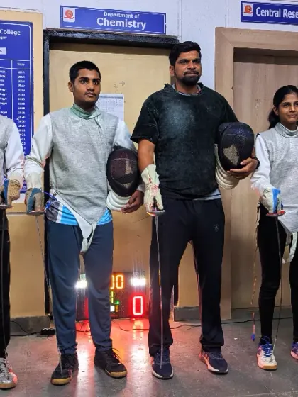 Our Khelo India Youth Games qualifiers Kartik, Arjun, and Anushka with me at our training facility. This photo was taken just before they left to represent the club at the national level.