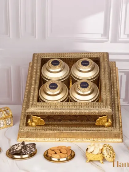 The Utsaah Gift Hamper is designed to celebrate Diwali with health and indulgence. It features gluten-free bliss bars, almond brittle, and roasted nuts packed in a beautiful antique-finish box.