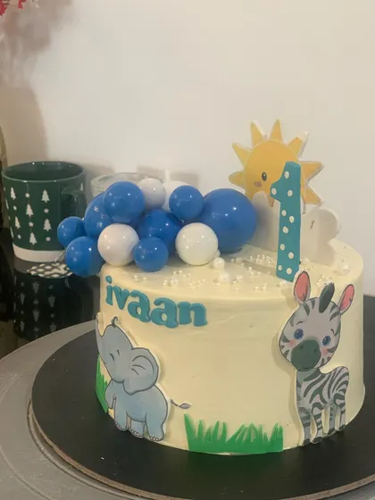 Another view of the jungle animal first birthday cake, this time featuring a cute zebra. I can customize the animals based on your child's favorites.