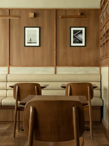 Further images from the BeWell, QBF Coffee, and Tubu projects, illustrating the consistent use of natural materials, clean lines, and thoughtful lighting to create serene and restorative commercial spaces.