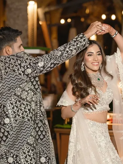 A candid shot of the bride and groom enjoying their dance. Our choreography is designed to feel natural, so you can relax and have fun.