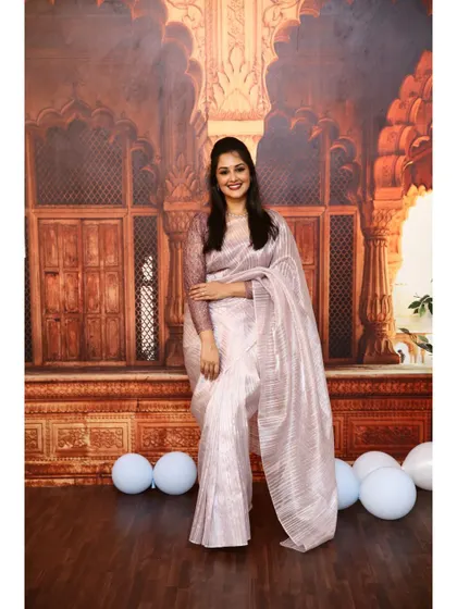 This is our grand palace-themed backdrop. It's a printed background that instantly adds a royal and traditional feel to any ethnic wear photoshoot.