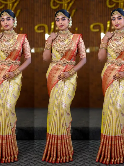 A classic temple bride look. The yellow and red silk saree is draped with perfectly stacked pleats, creating a timeless and statuesque silhouette.