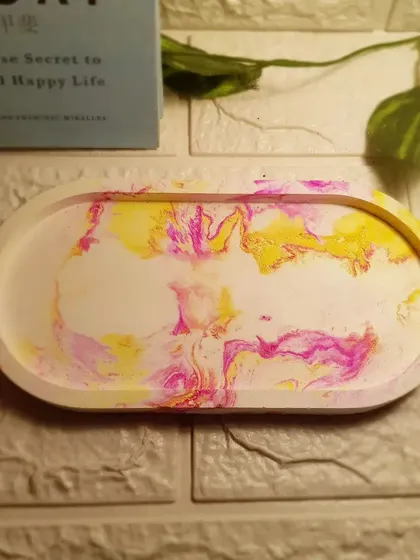 A top-down view of the candy-colored oval tray, showing the fun and playful pattern.
