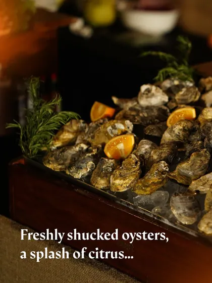 A close-up of our fresh oyster bar, a perfect pairing for celebratory events.